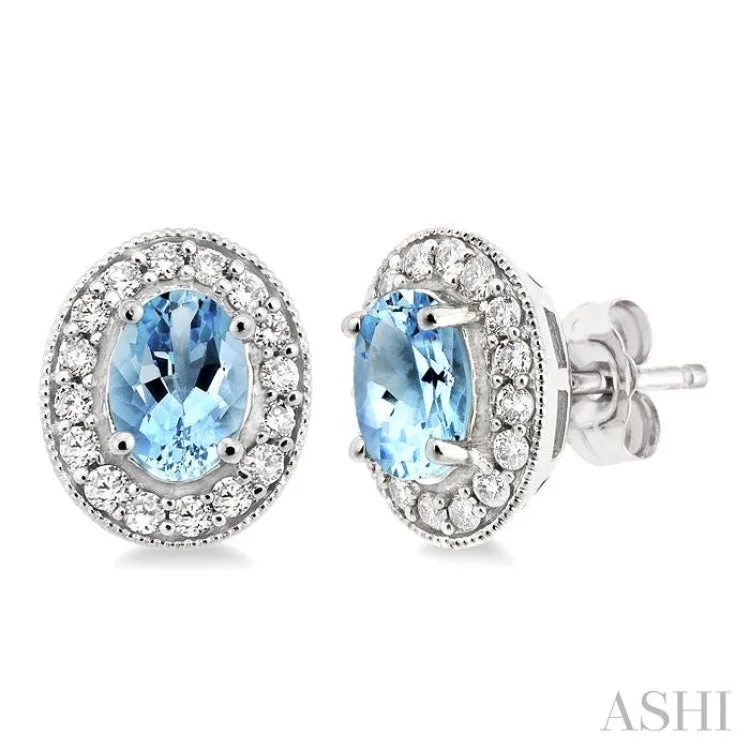 Women’s vintage hoop earrings-7x5mm Oval Cut Aquamarine and 3/8 Ctw Round Cut Diamond Earrings in 14K White Gold