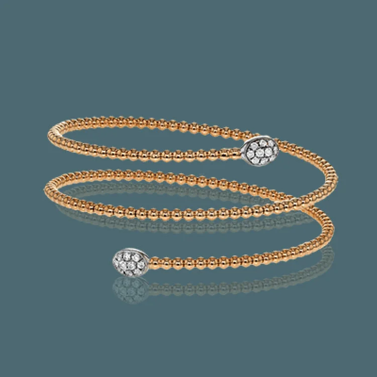 Women’s handmade bracelets-This triple twist bangle is incredibly comfortable and easy to wear, making it perfect for every occasion. A .30 ctw of white diamonds add the perfect amount of sparkle on either end. Perfect for stacking.