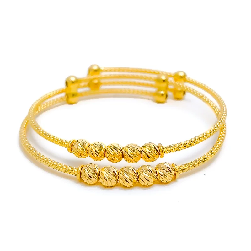 Women’s stackable silver bracelets-Shimmering Ritzy Bead 22k Gold Baby Bangles