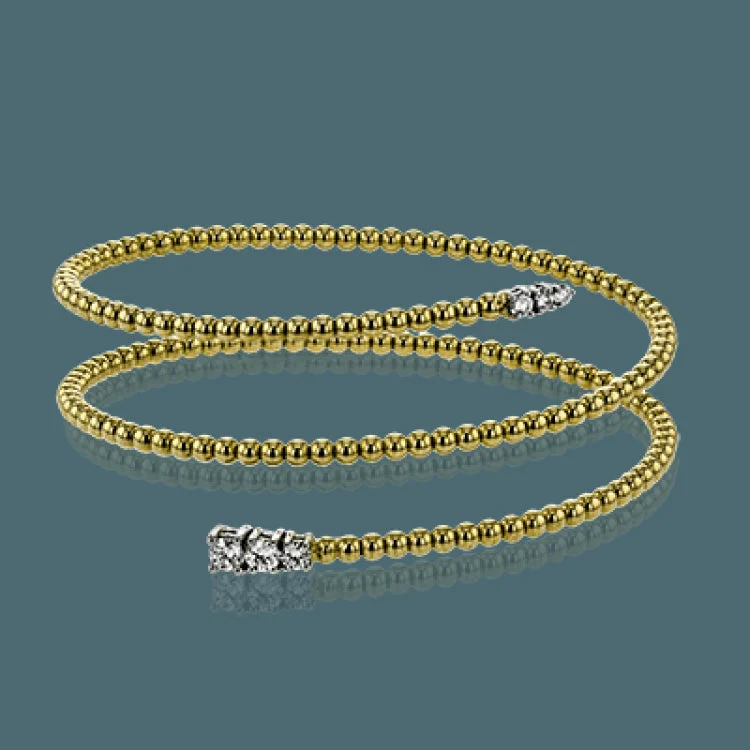 Women’s jade bangles-This spiral bangle look great stacked but also makes the perfect statement on its own. It contains a total of .54 ctw of white diamonds.