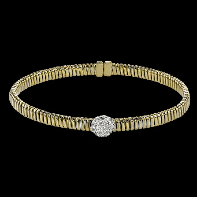 Women’s gemstone bangles-18K Yellow gold textured bangle with round diamond accent .25 ctw. and magnetic closure, is a perfect bangle for stacking