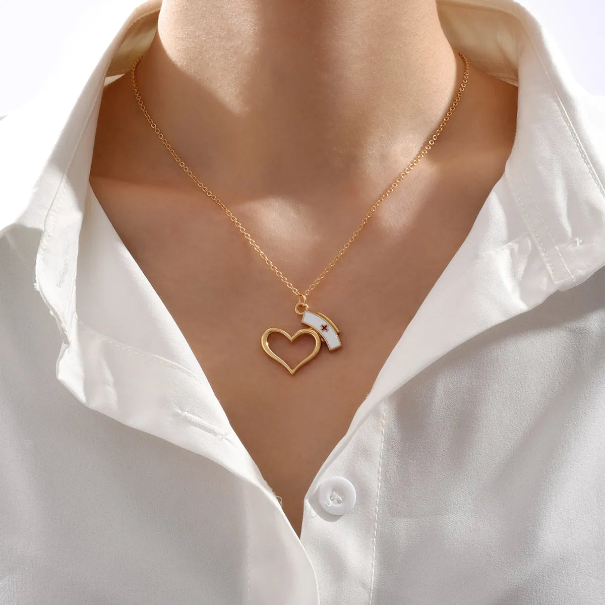 Women’s vintage-style pendants-Fashion Hollow Heart Nurse Hat Pendant Alloy Necklace