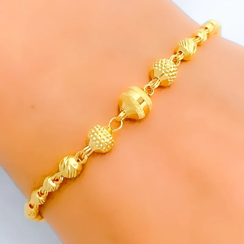 Women’s colorful bangles-Stately Striped Orb 22k Gold Bracelet