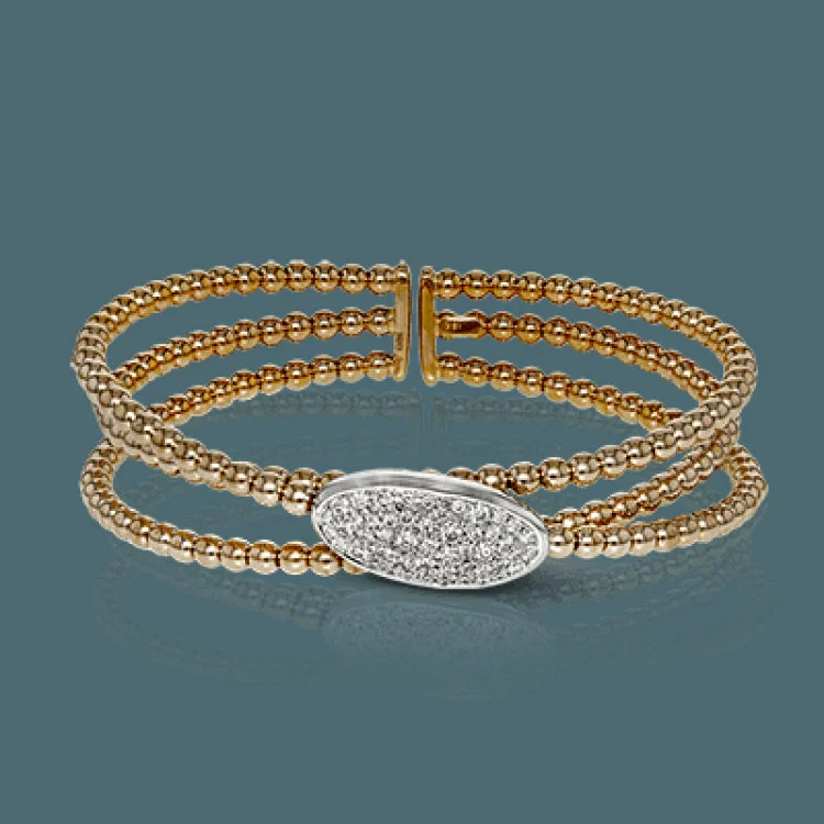 Women’s rose gold bracelets-This modern bangle features and incredibly easy-to-wear design and .70 ctw of shining white diamonds.