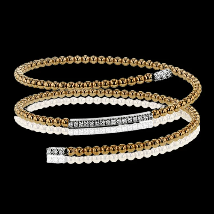 Women’s statement cuffs-This delicate rose gold bangle hugs the wrist with its understated .42 ctw of white diamond accents in white gold. Perfect for stacking.