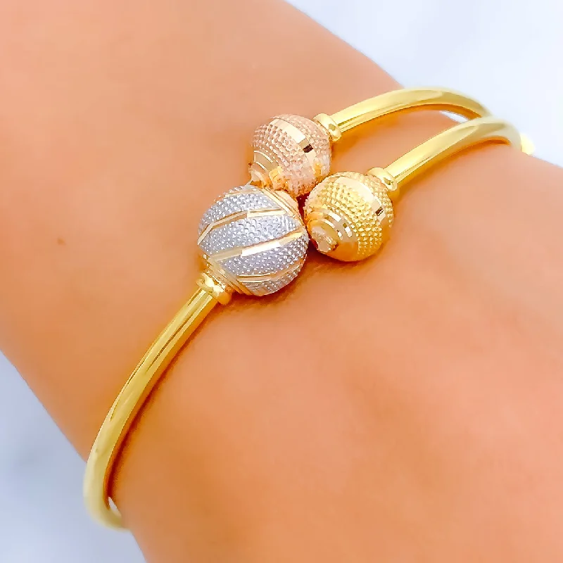 Women’s luxury gold bracelets-Graceful Striped Orb 22k Gold Bangle Bracelet