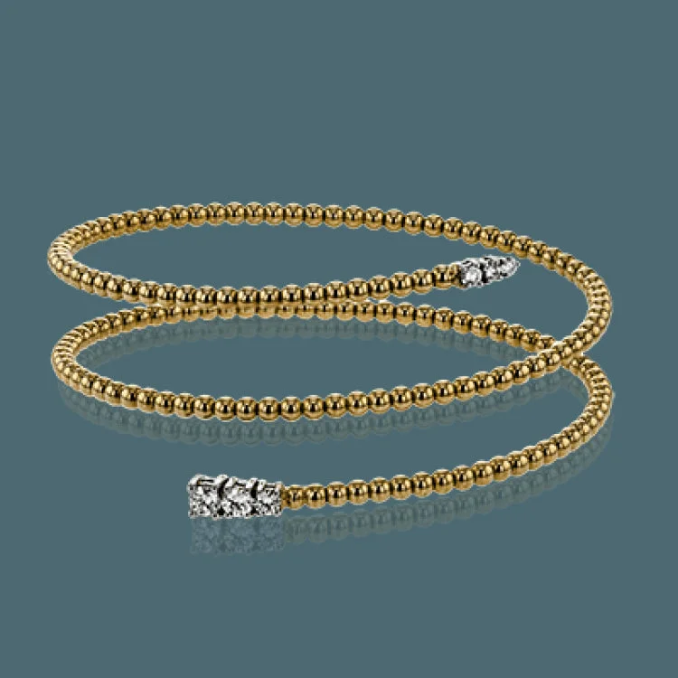 Women’s high-end bracelets-This spiral bangle look great stacked but also makes the perfect statement on its own. It contains a total of .54 ctw of white diamonds.