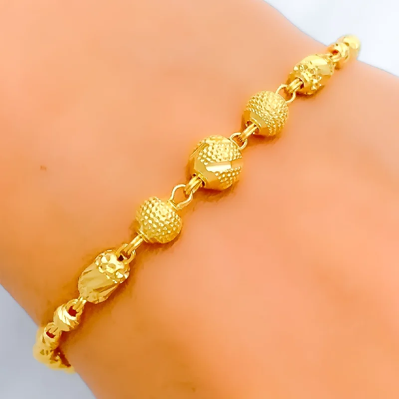 Women’s gold chain bracelets-Timeless Striped Orb 22k Gold Bracelet