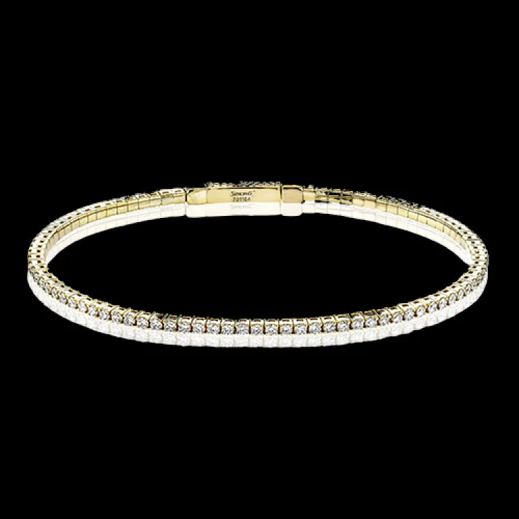 Women’s silver stackable bangles-Dress up any outfit with this yellow gold diamond bangle gleaming with 1.5 ctw of round brilliant diamonds.