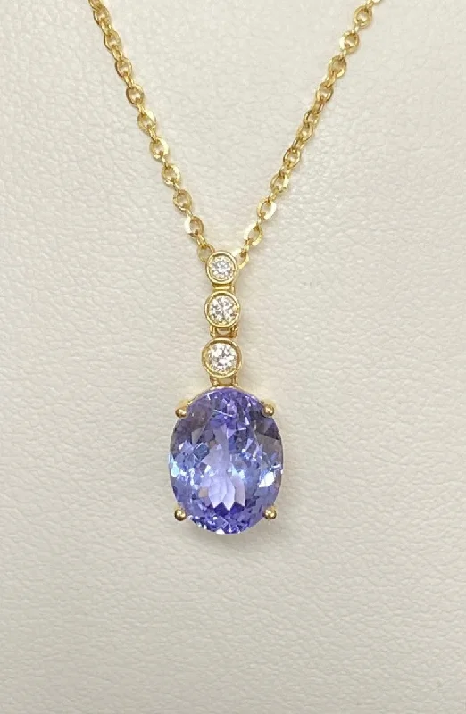 Women’s diamond pendants-14kt Yellow Gold Tanzanite and Diamond Pendant