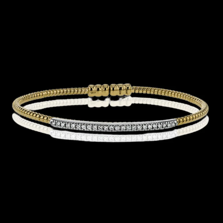 Women’s personalized bracelets-This 18k 2t white and yellow gold bangle is incredibly easy to wear, while providing a complete dose of style with .24 ctw of white diamonds. Perfect for stacking.