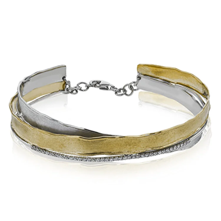 Women’s adjustable bangles-This two tone rose & white gold bangle is an artistic blend of brushed matte finish with hammered edges, gently twisted together and accented by 0.24 ctw of diamonds.