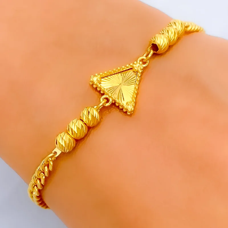 Women’s luxury bangle sets-Tasteful Triangular 21k Gold Bracelet