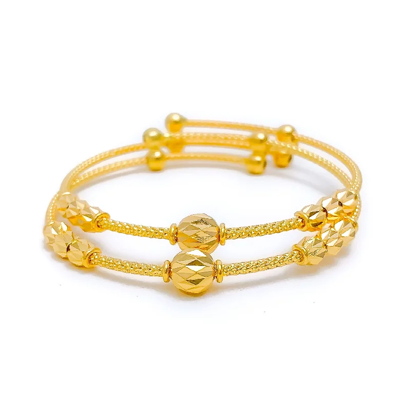 Women’s gemstone charm bracelets-Dazzling Ornate 22k Gold Beaded Baby Bangles