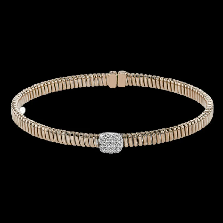 Women’s designer bangles-This modern design 18k rose gold textured bangle with .19ctw diamonds set in a cushion shape and magnetic closure, is perfect for stacking