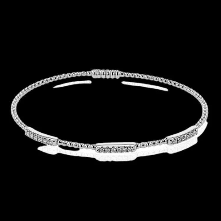 Women’s luxury bangles-18K white gold beaded stackable bangle with 3 stations of diamonds 0.23 ctw, and a magnetic closure