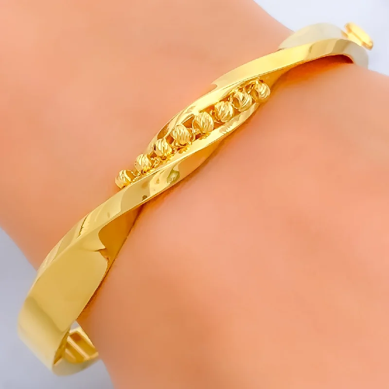 Women’s custom name bracelets-Iconic Flowing 22k Gold Bangle Bracelet