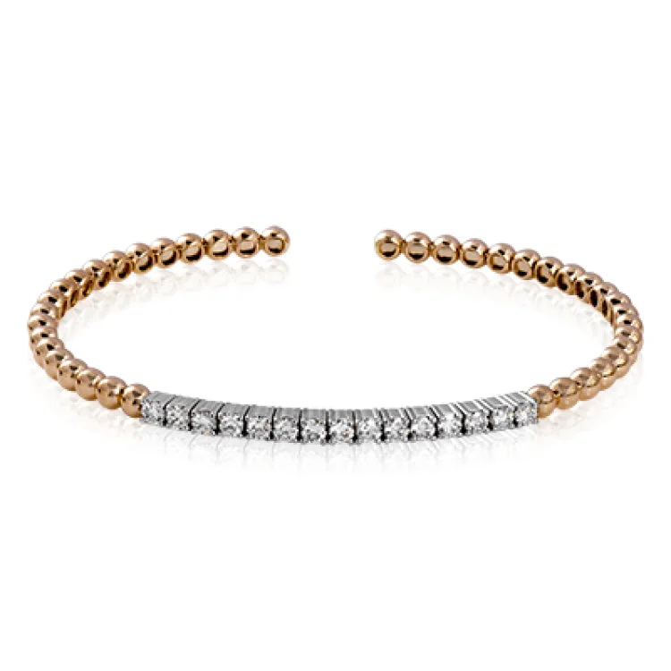 Women’s luxury tennis bracelets-This wonderful bangle showcases a straight line of .97 ctw of white diamonds set within 18k rose gold beads.