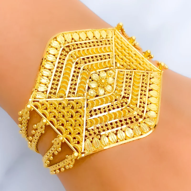 Women’s minimalist charm bracelets-Opulent Paisley Accented 22K Gold Statement Bracelet