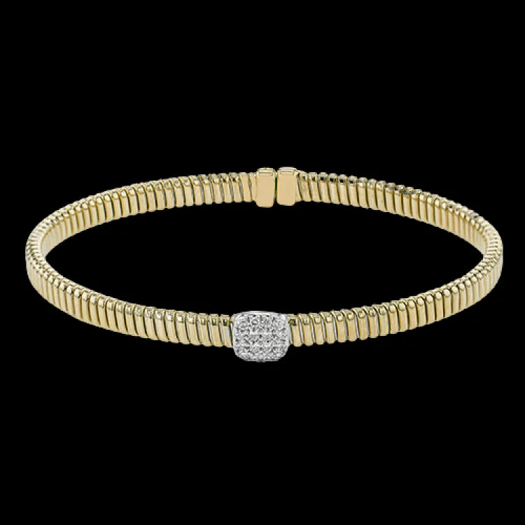 Women’s statement bracelets-This modern design 18k yellow gold textured bangle with .19ctw diamonds set in a cushion shape and magnetic closure, is perfect for stacking