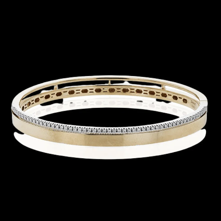 Women’s heart-shaped bracelets-This stunning rose gold bangle has a matte finish and is accented by a row of white diamonds 0.32 ctw., along its edge.