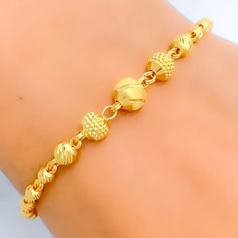 Women’s infinity bracelets-Sophisticated Striped Orb 22k Gold Bracelet