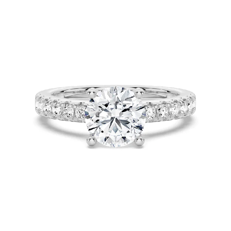 Women’s twist engagement rings-Round Moissanite Engagement Ring With Split Prong Side Accents